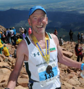 Peter with his ‘2014 Finisher’ medal at the summit of Pikes Peak
